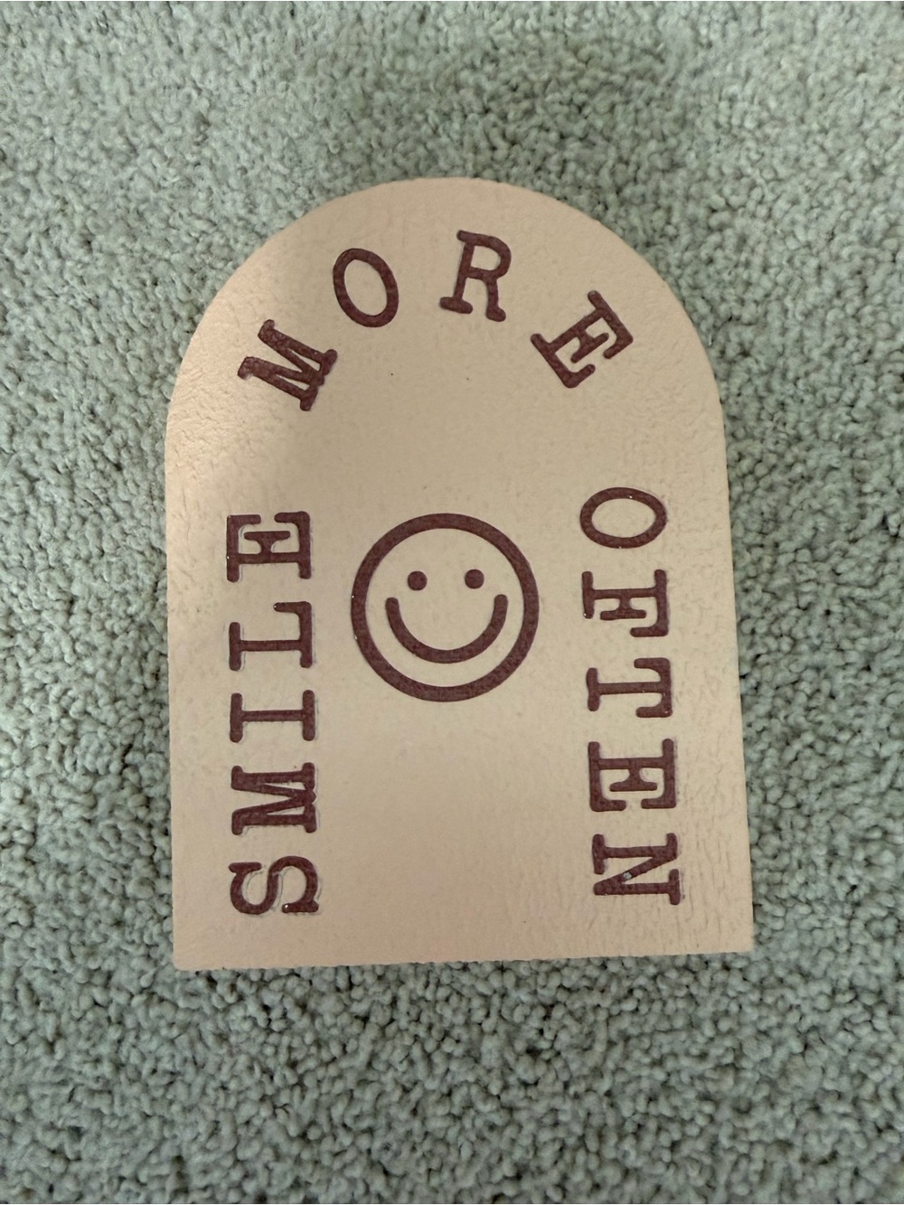 Ashland Beige Sign with Brown Smiley Text